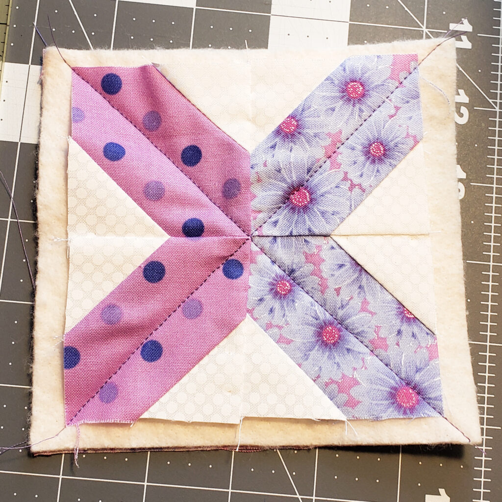 Image of the quilt scrap being made into a coaster