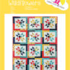 A Sunshine & Wildflowers quilt with bright colors and exciting shapes made by Yellow Umbrella Quilts.